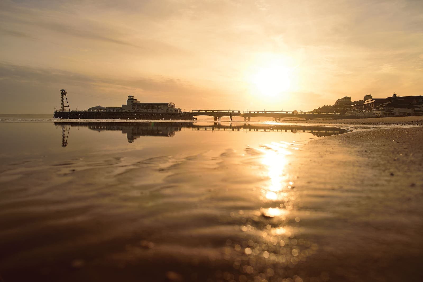 Bournemouth Pier from the beach at sunset