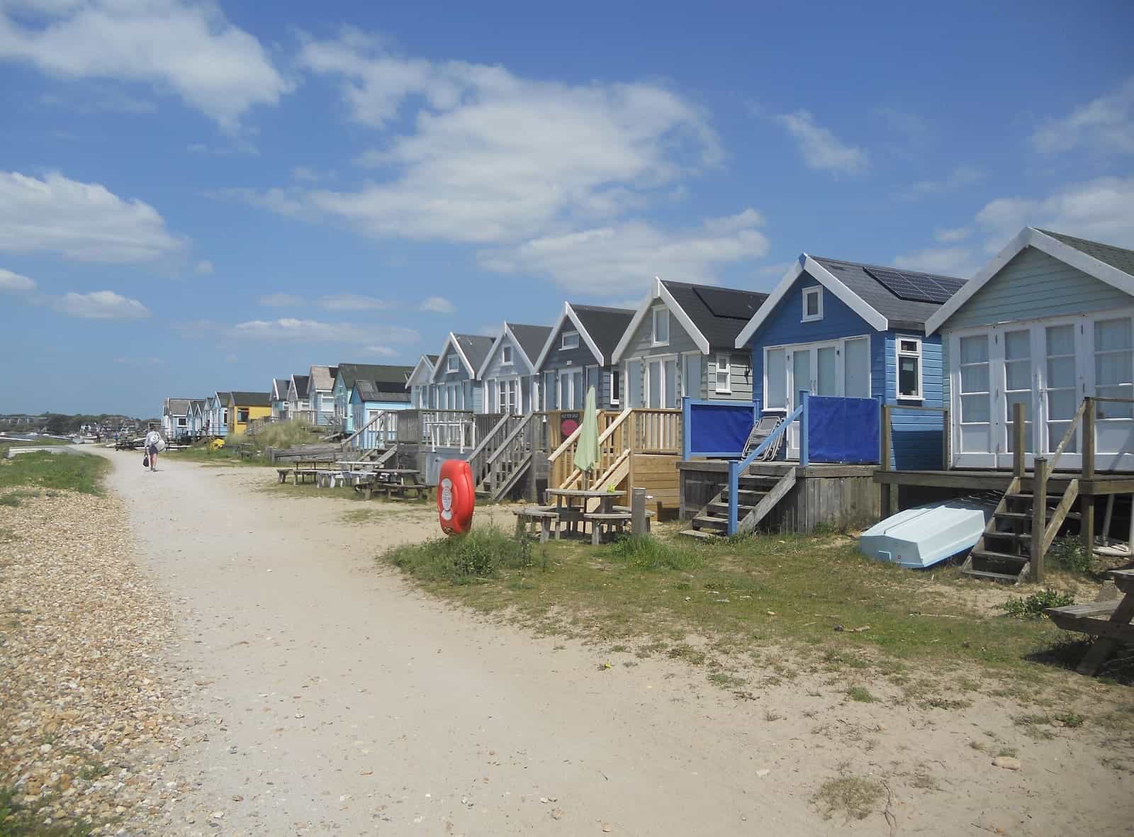 Beach huts along the path on Mudeford Sandbank, Christchurch